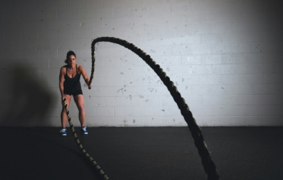 A woman swinging ropes