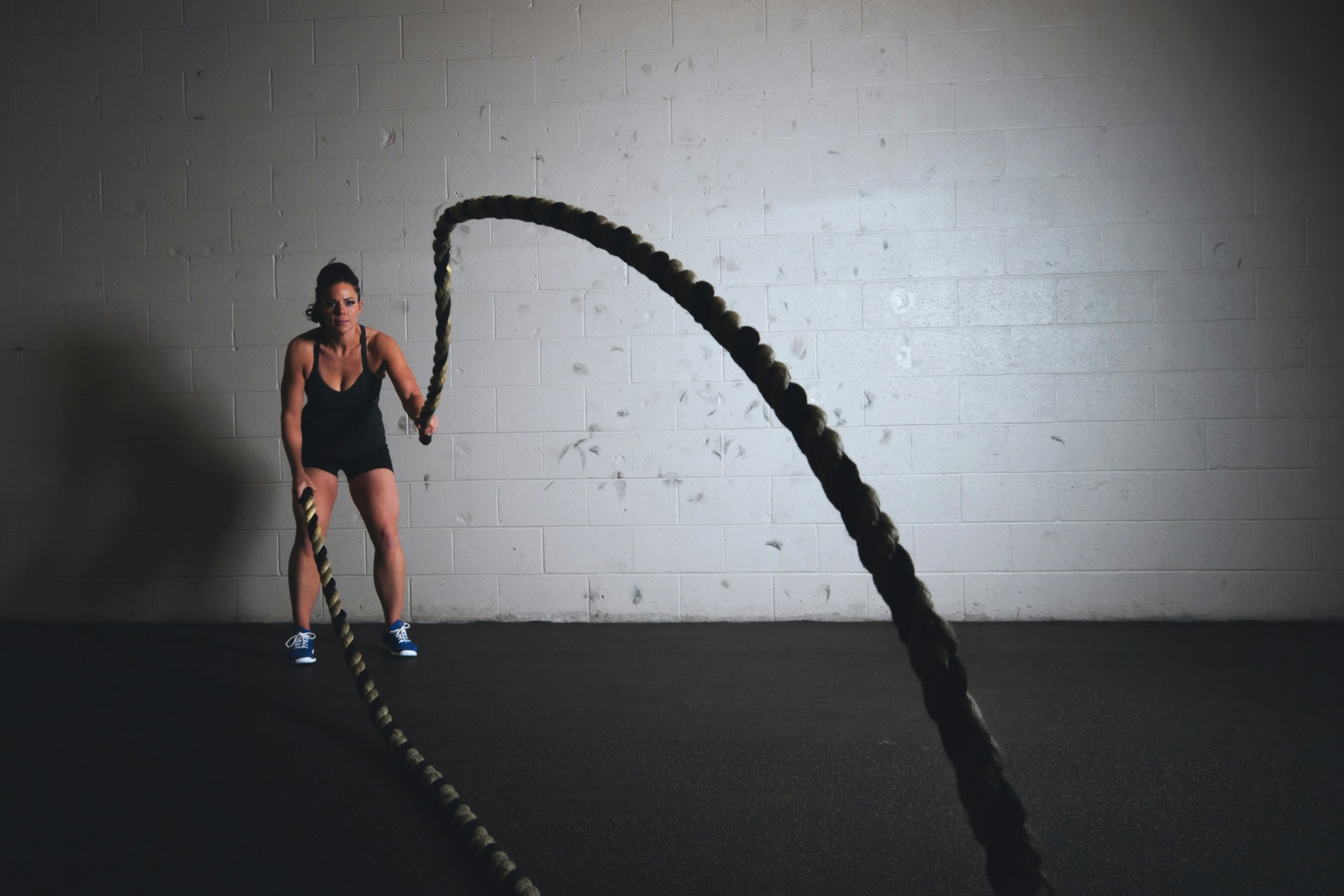 A woman swinging ropes