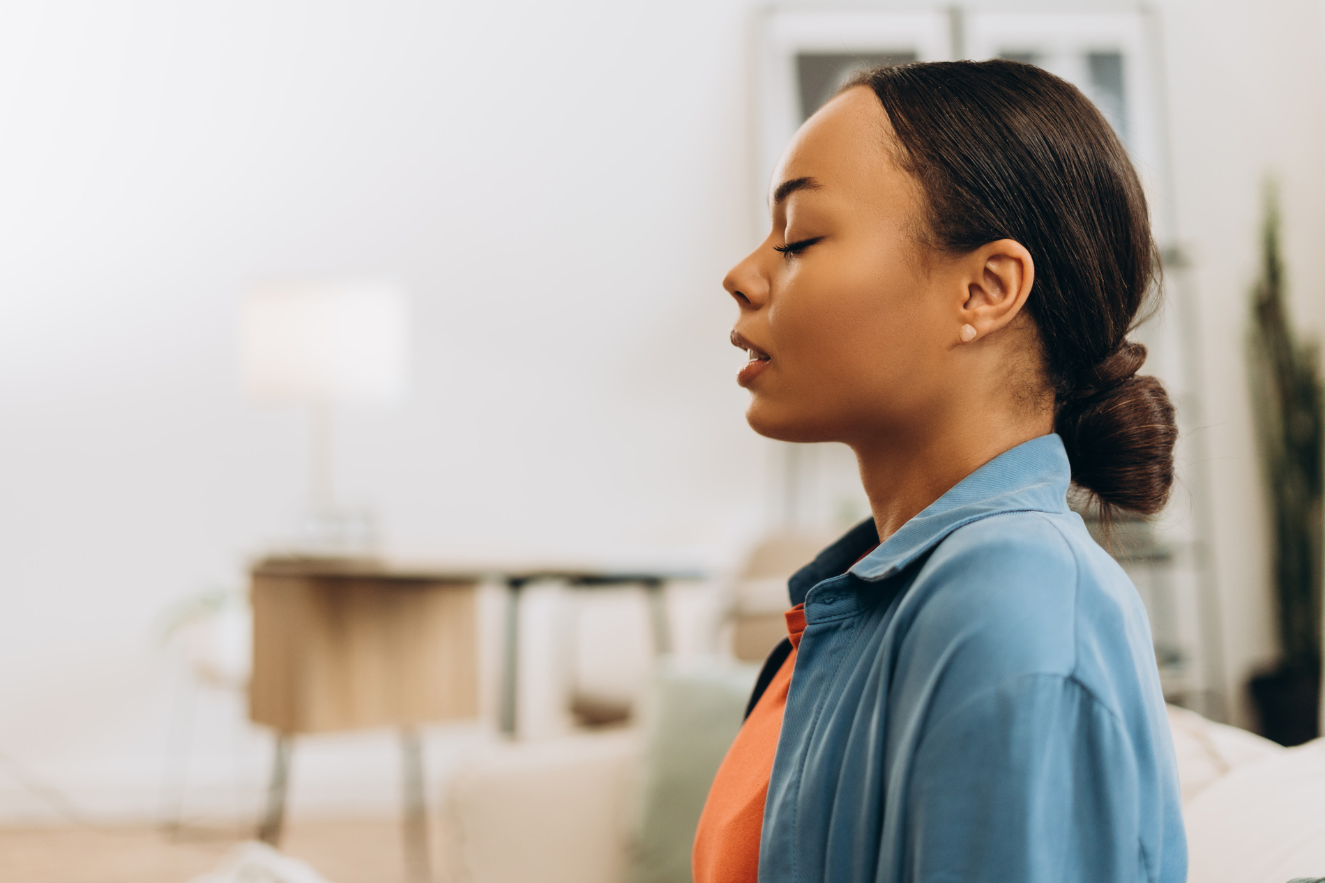 a woman doing breathing exercises