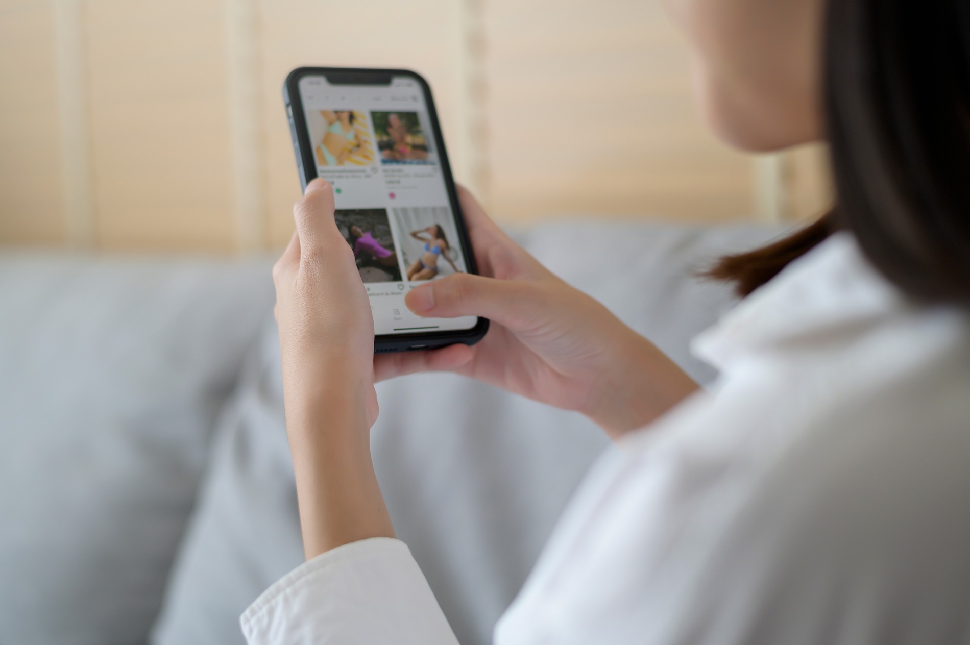 a woman using her phone