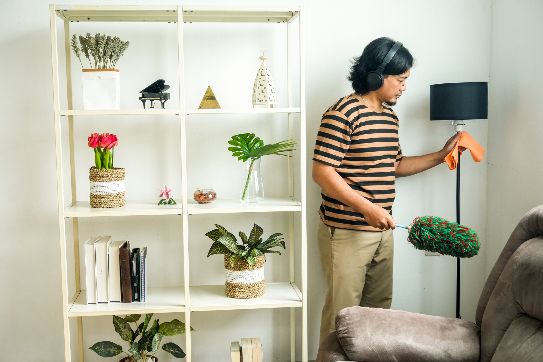 person organizing a room