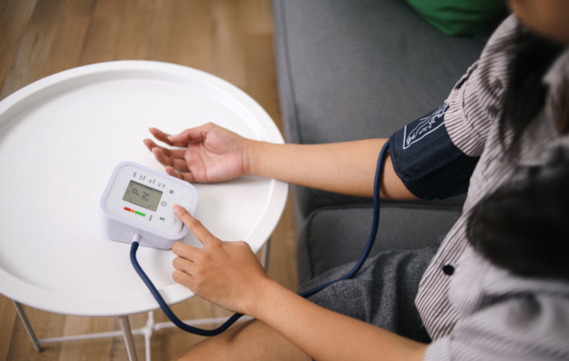 checking blood pressure
