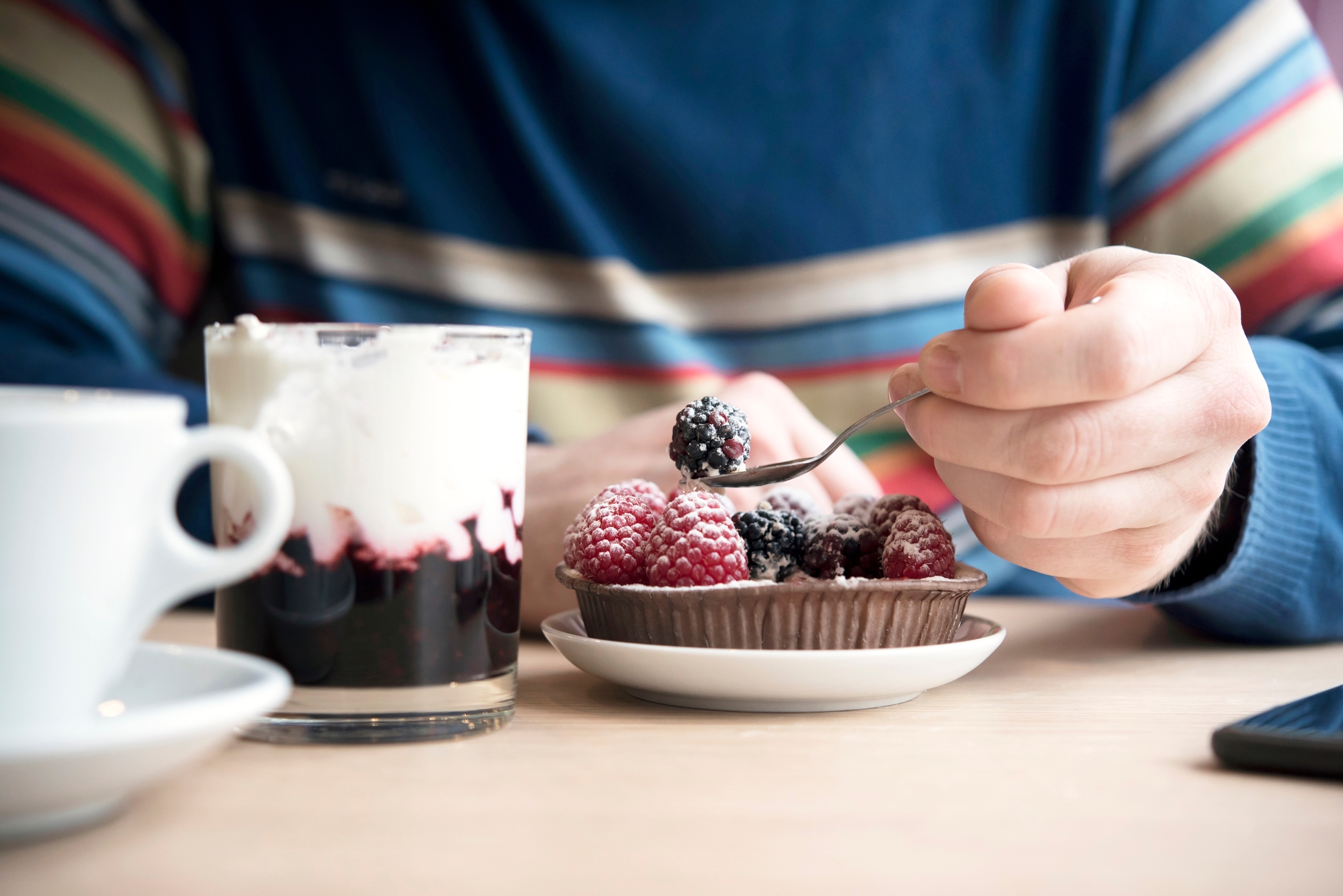 person eating dessert