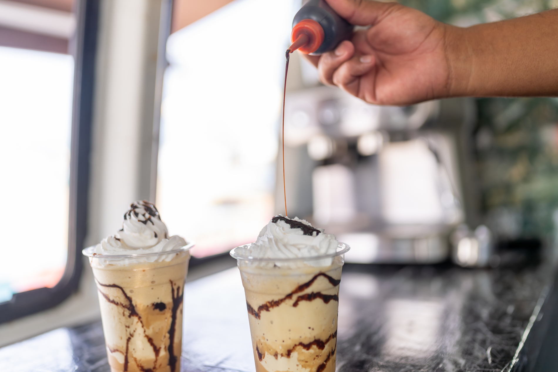 Barista preparing iced coffee