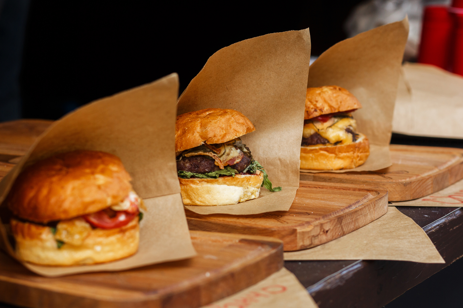 Juicy burgers on serving paper