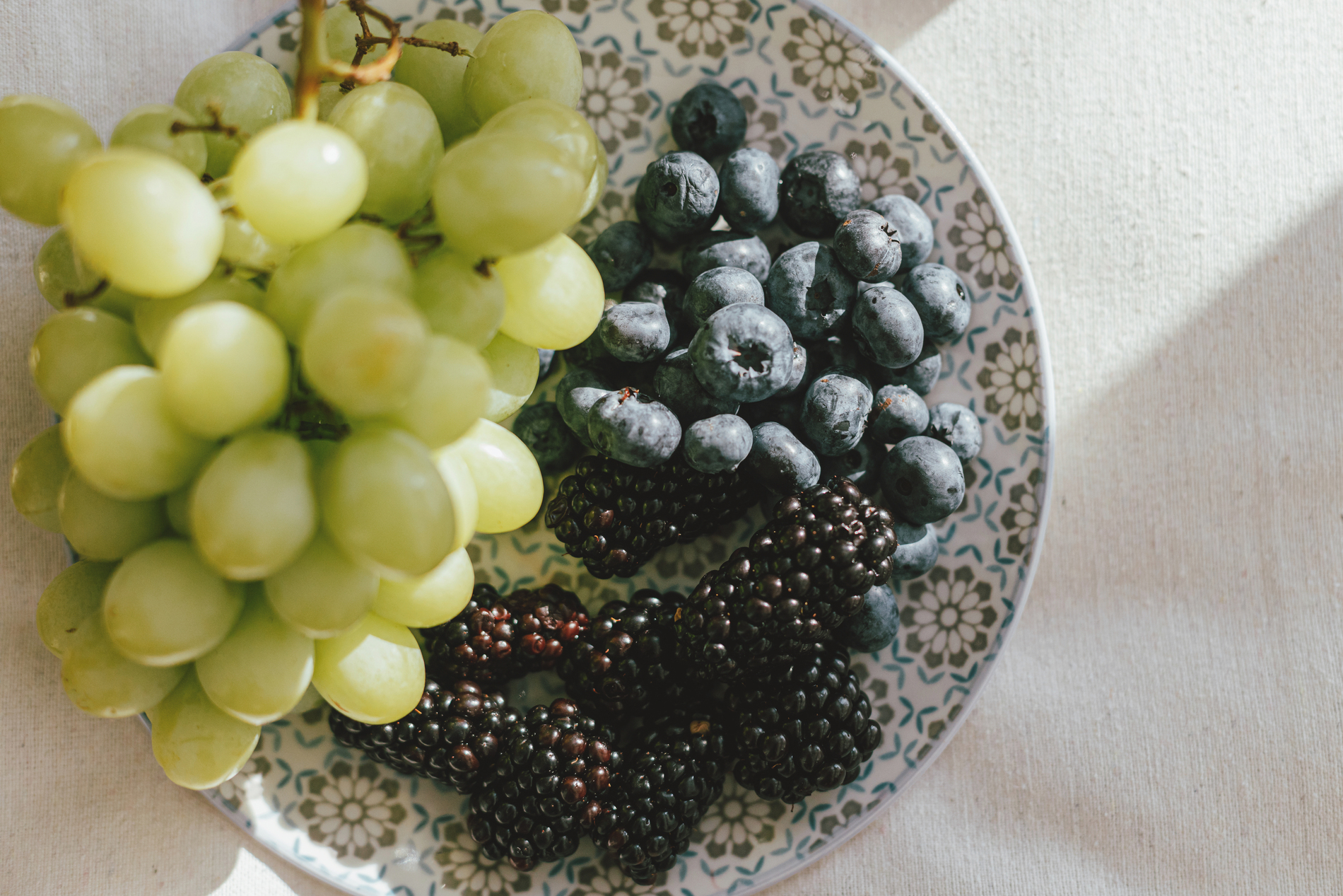 Fresh grapes with other berries
