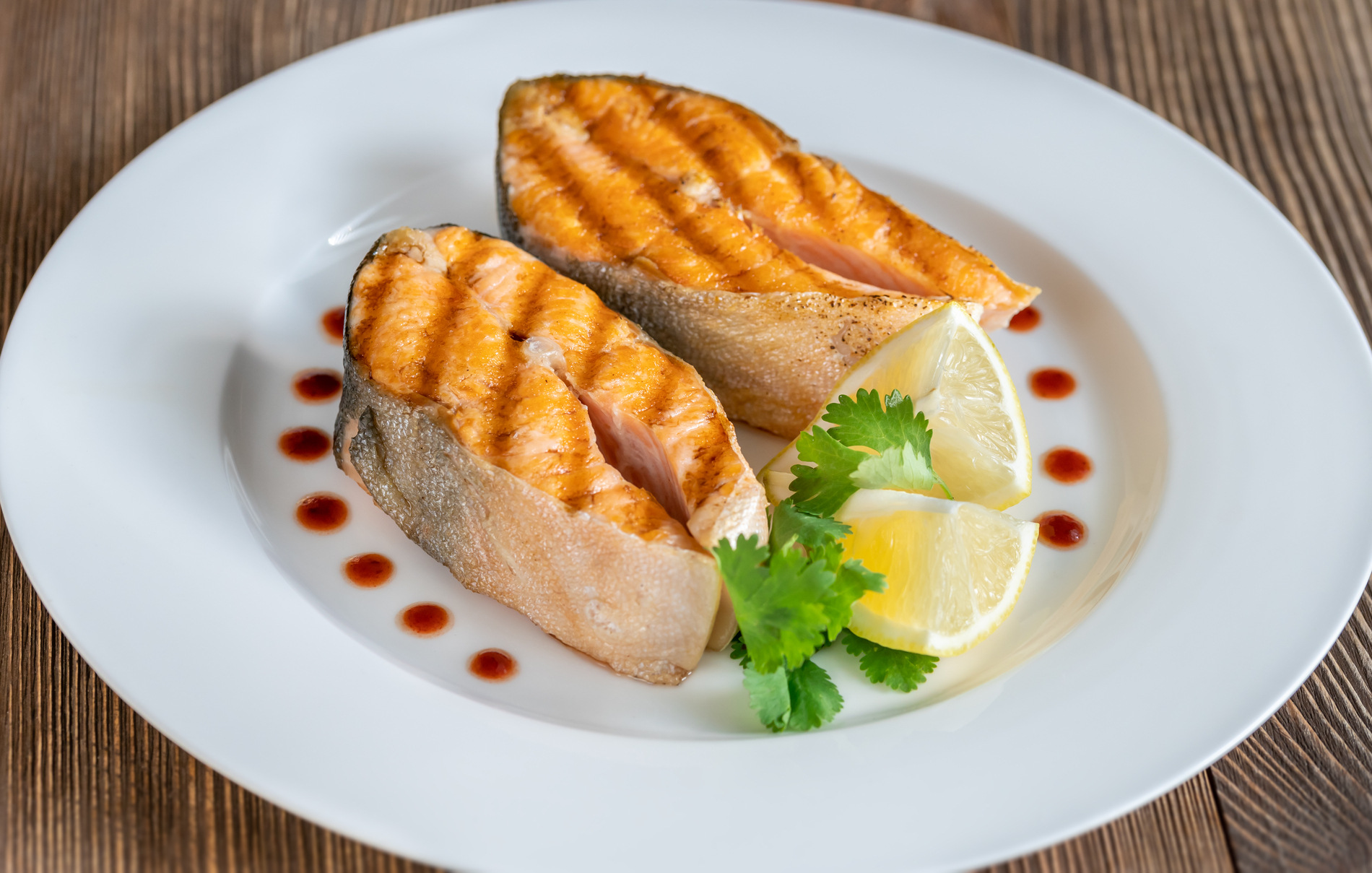Grilled arctic char fish steak