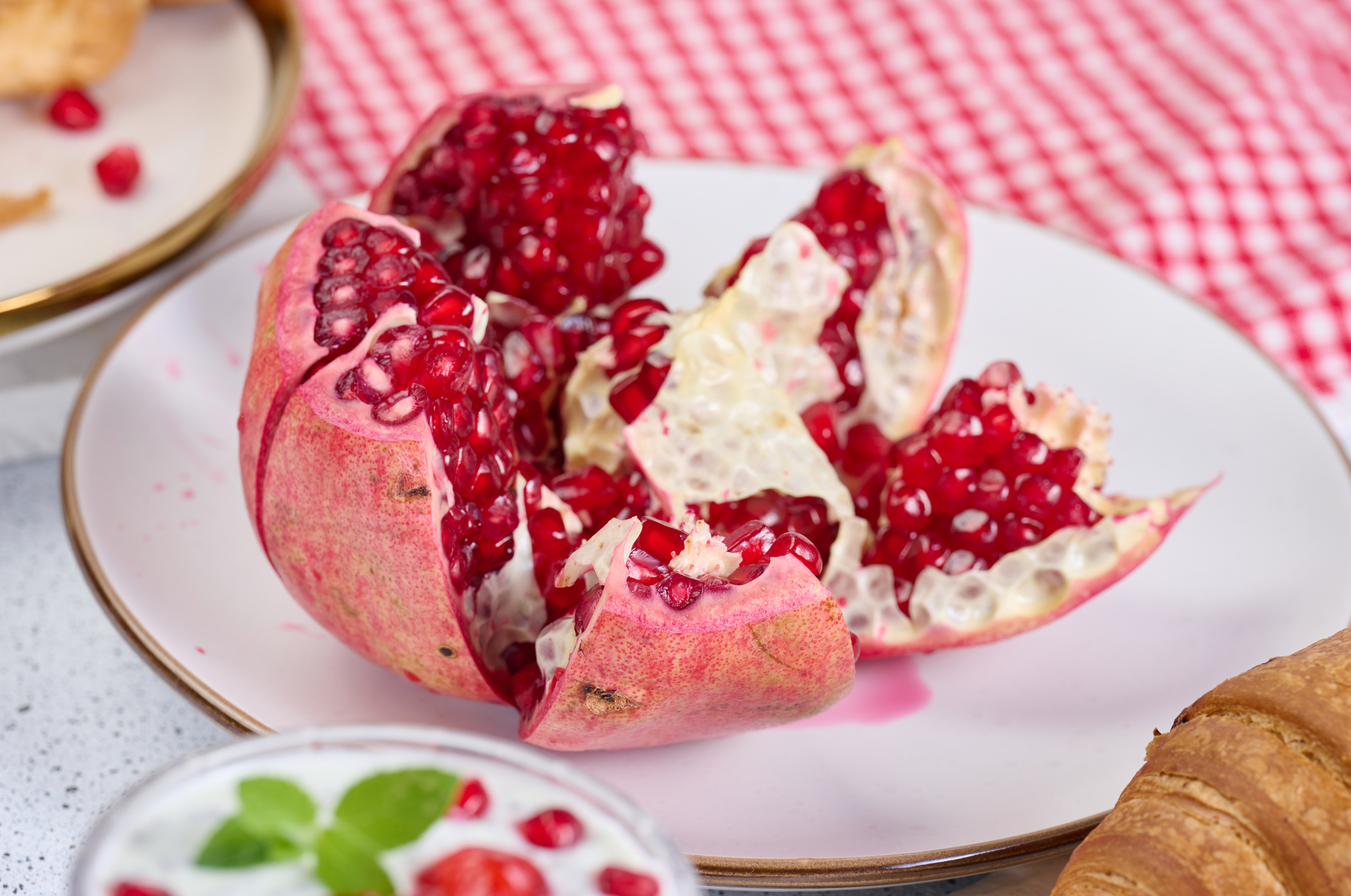Ripe pomegranate with red seeds